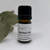 small brown bottle of niaouli essential oil, a native australian plant used in aromatherapy