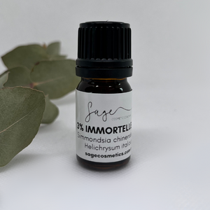 small bottle of immortelle essential oil, also known as helichrysum. Rejuvenating, calming and supports creativity