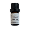 Bottle of lime oil with a black cap on a white background