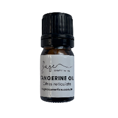 Bottle of tangerine oil with a white label on a white background